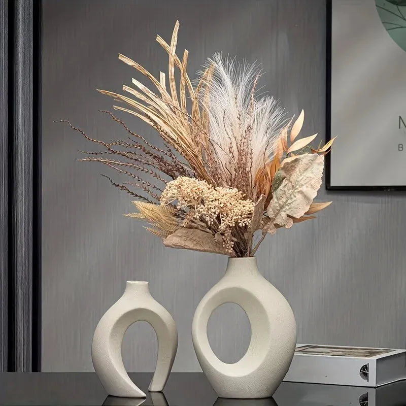 Elevate your home décor with the Snuggle Hollow Ceramic Vase Set of 2 Nordic, a timeless combination of minimalist design and modern elegance.