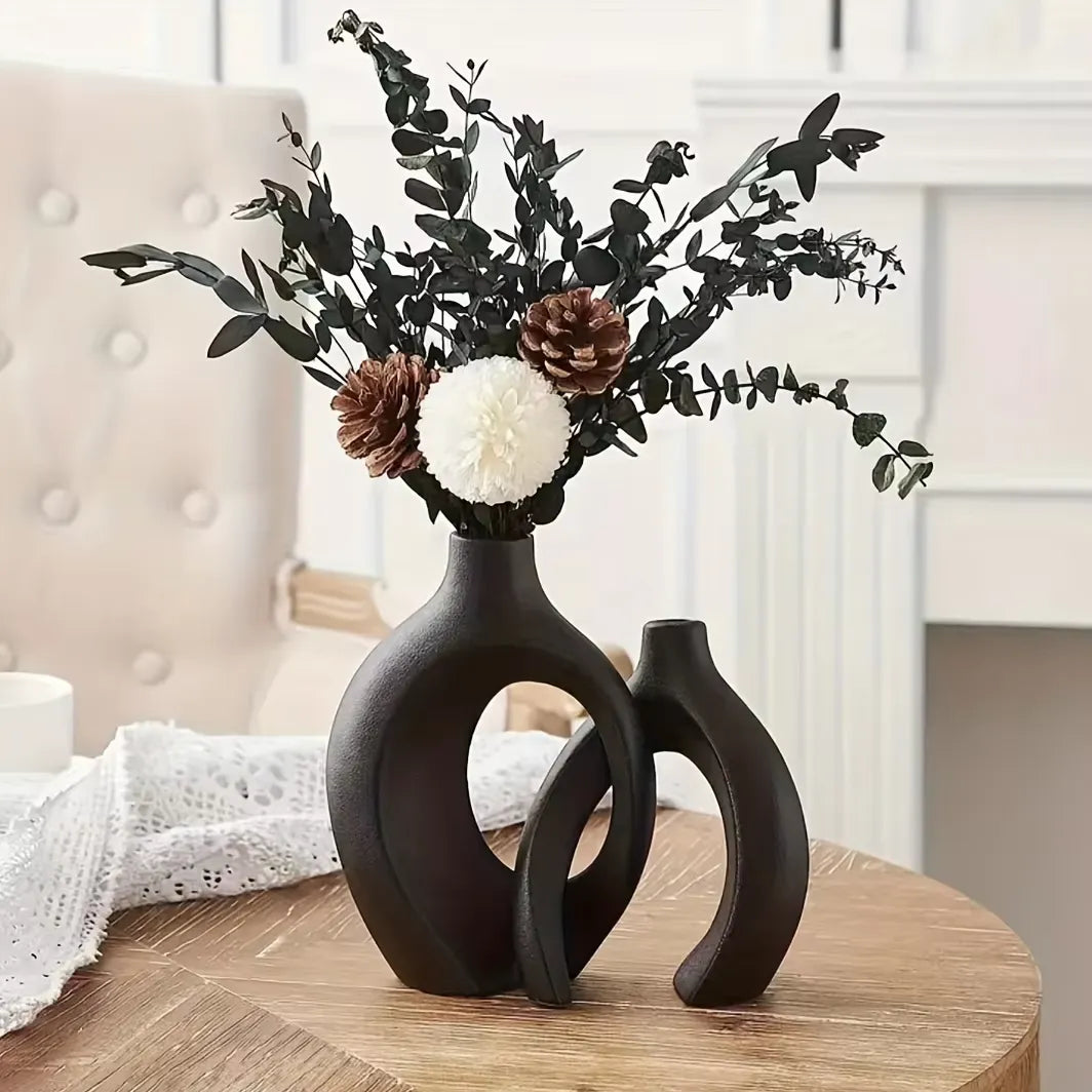 Elevate your home décor with the Snuggle Hollow Ceramic Vase Set of 2 Nordic, a timeless combination of minimalist design and modern elegance.