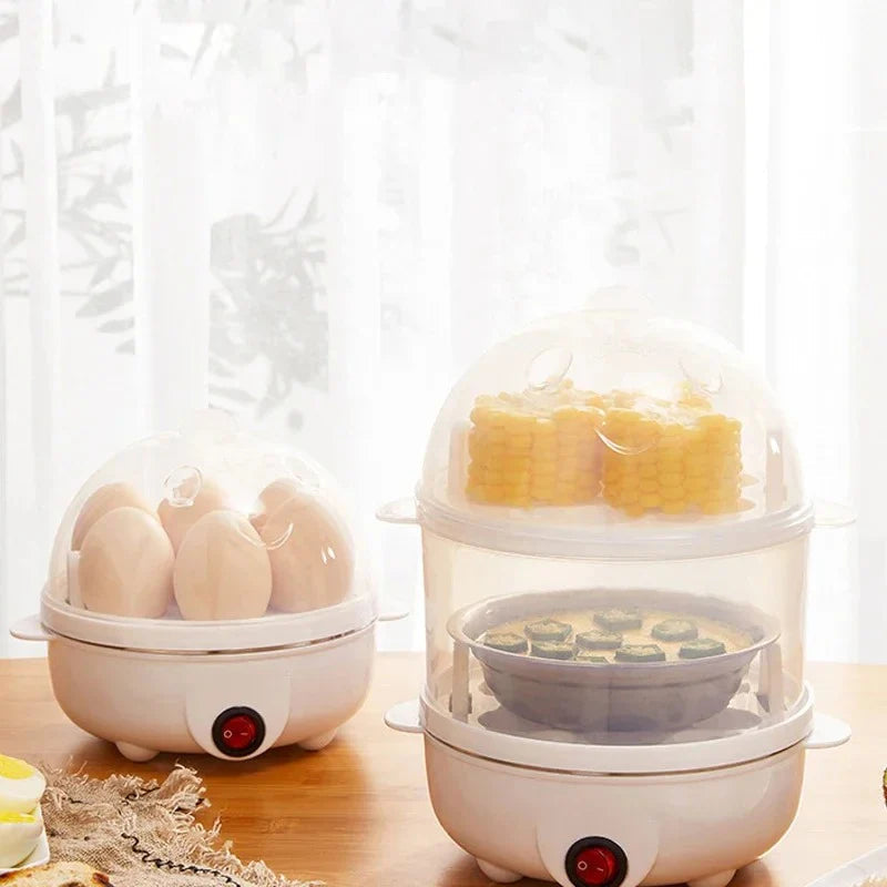 Double Tier Egg Cooker displayed on a wooden table, showcasing eggs and corn in a modern transparent design.